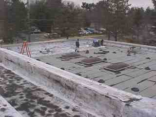 Photo of parapet work by Roof Menders